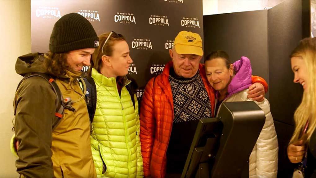 Family uploading their risk taking story with brand ambassador help at the kiosk at theFrancis Ford Coppola headquarters at Sundance