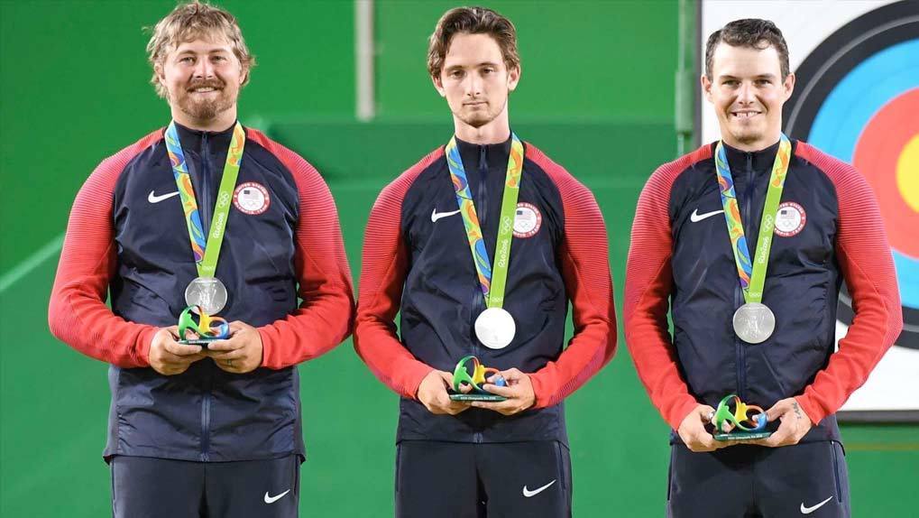US Male Olympic Team receiving silver medals